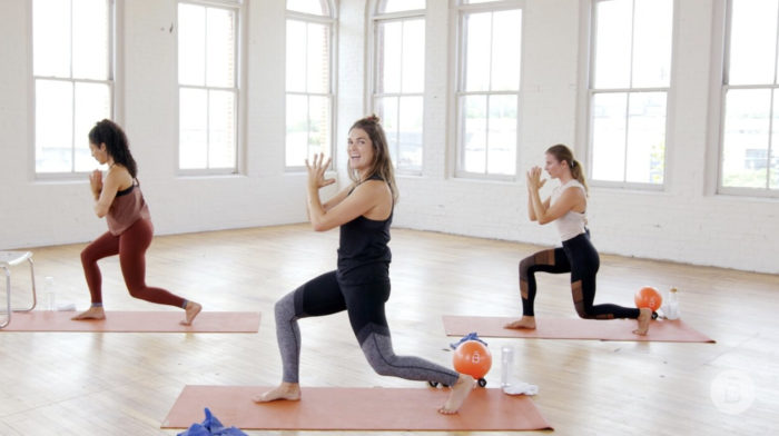 In addition to a barre, Barre3 workouts use balls, resistance bands, and two-pound weights. Image: Barre3